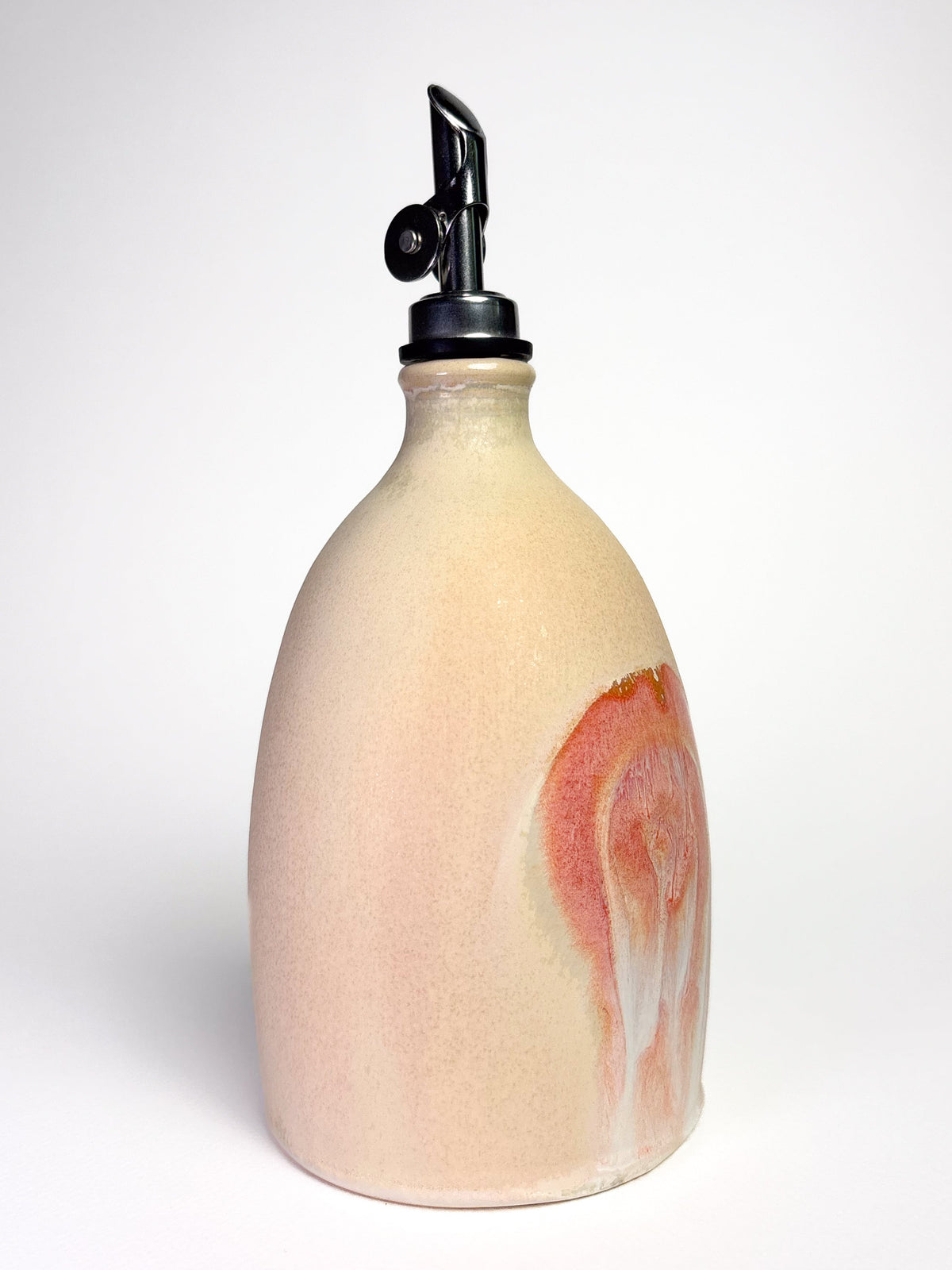 Bouteille huile spirale rose
